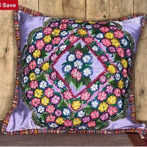 Purple hand embroidered accent pillow